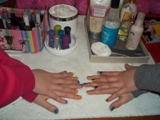 girls showing their newly painted nails during a mobile spa party in the gta